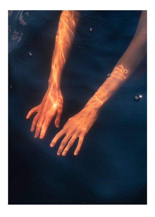 Fe