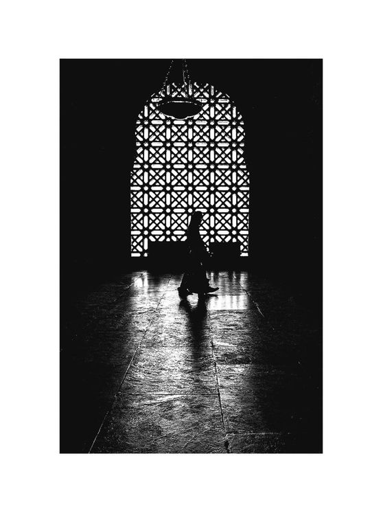 Nun Walking In Light